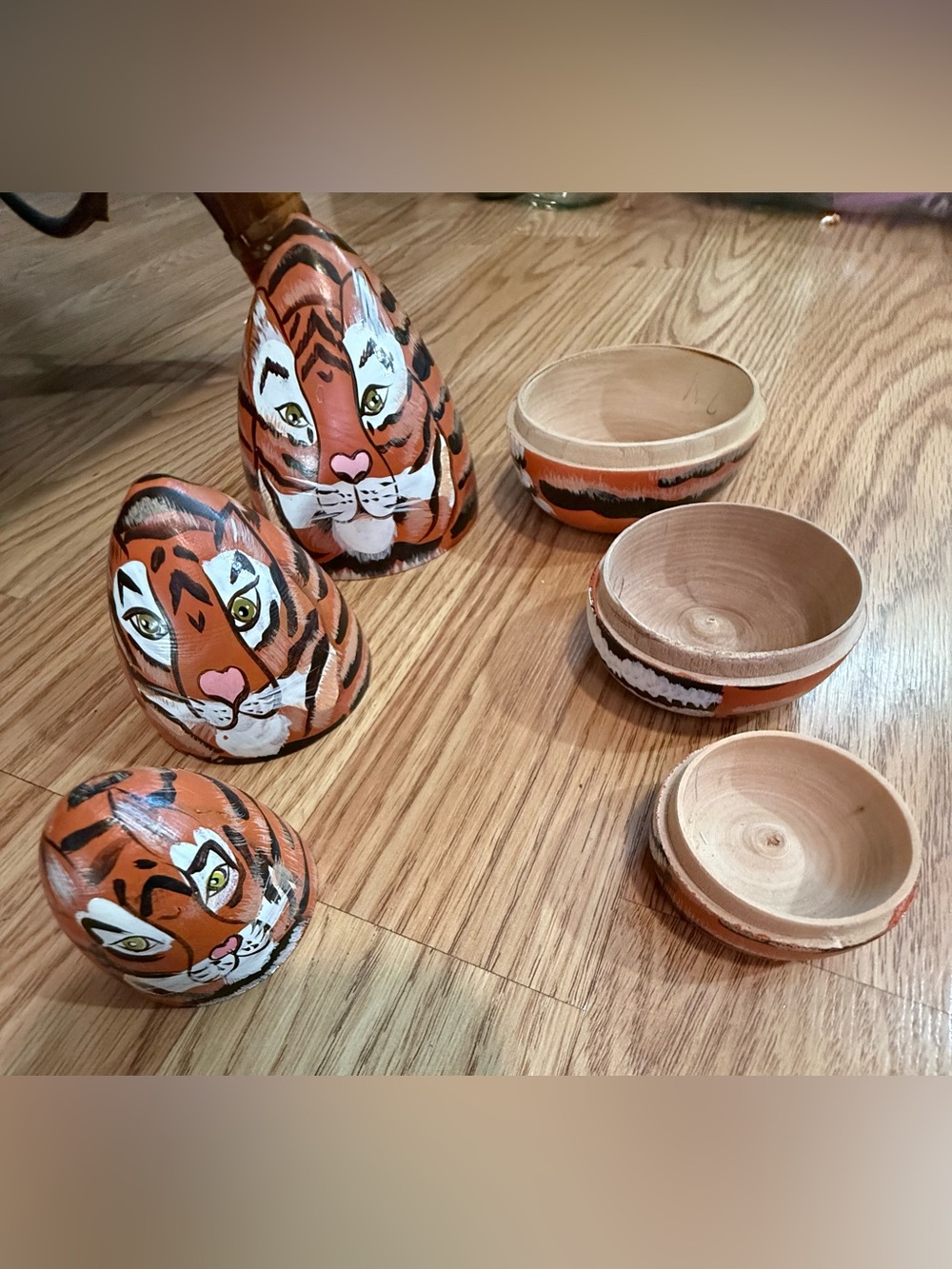 Tiger wood nesting dolls beautifully hand painted .